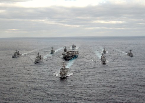 US_Navy_031130-N-3653A-002_USS_George_Washington_(CVN_73)_Carrier_Strike_Group_formation_sails...jpg