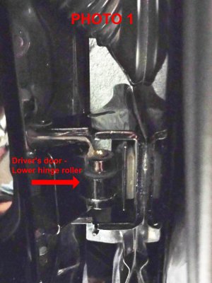 drivers side door hinge roller.jpg