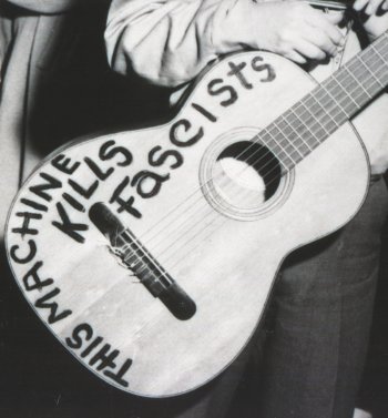 Woody-Guitar-Close-Up-THis-Machine-cropped.jpg